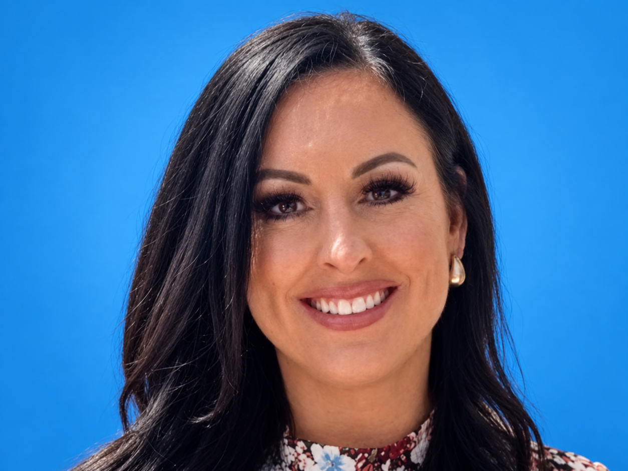 Portrait of Tiffany Prince, VP of Business Development at RVNU