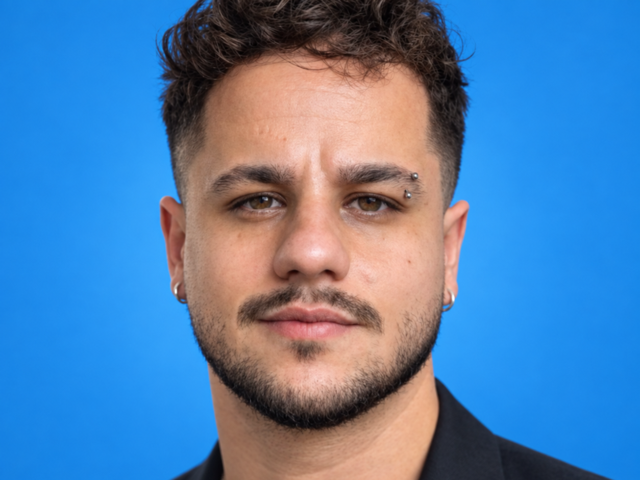Portrait of Will Dias, Marketing Coordinator at RVNU